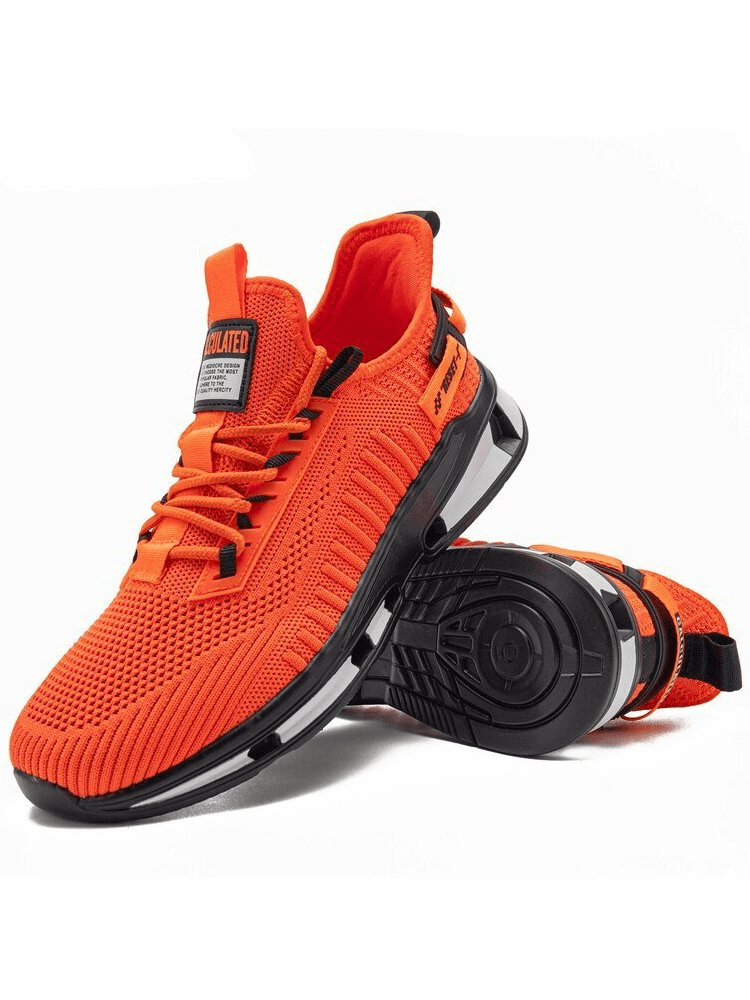 Orange shock absorbing breathable non-slip men's sneakers with EVA insole and TPR outsole for stability and comfort.